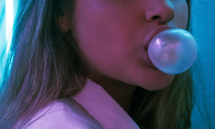image of girl blowing bubble gum