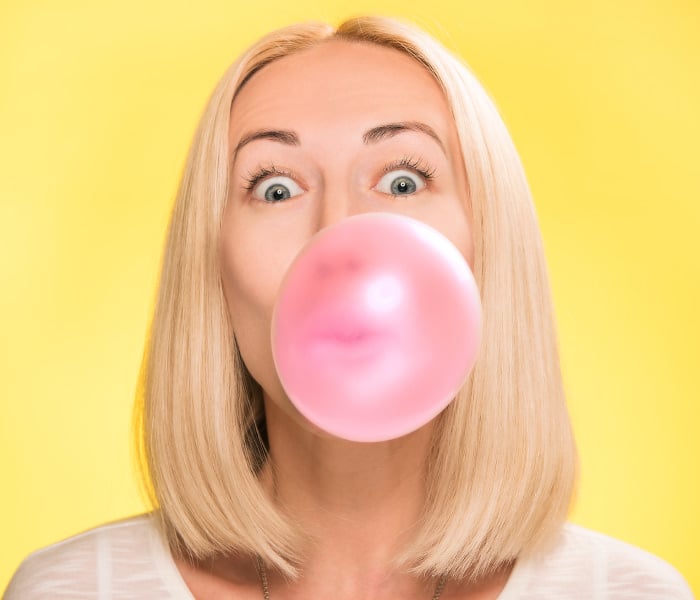 women chewing gum